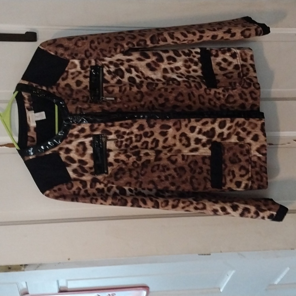 Beautifully made chico's brand size2 leopard jacket lined light weight .